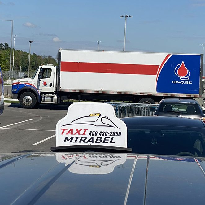 Taxi Mirabel et camion d'Héma-Québec